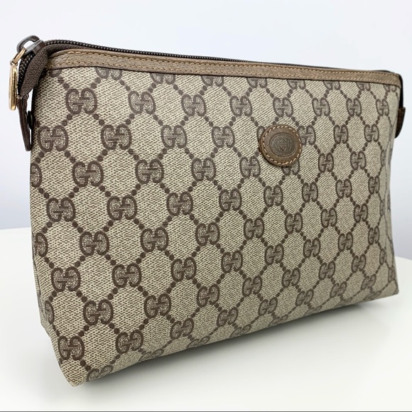 Gucci Handbags - Gucci Monogram Clutch Bag